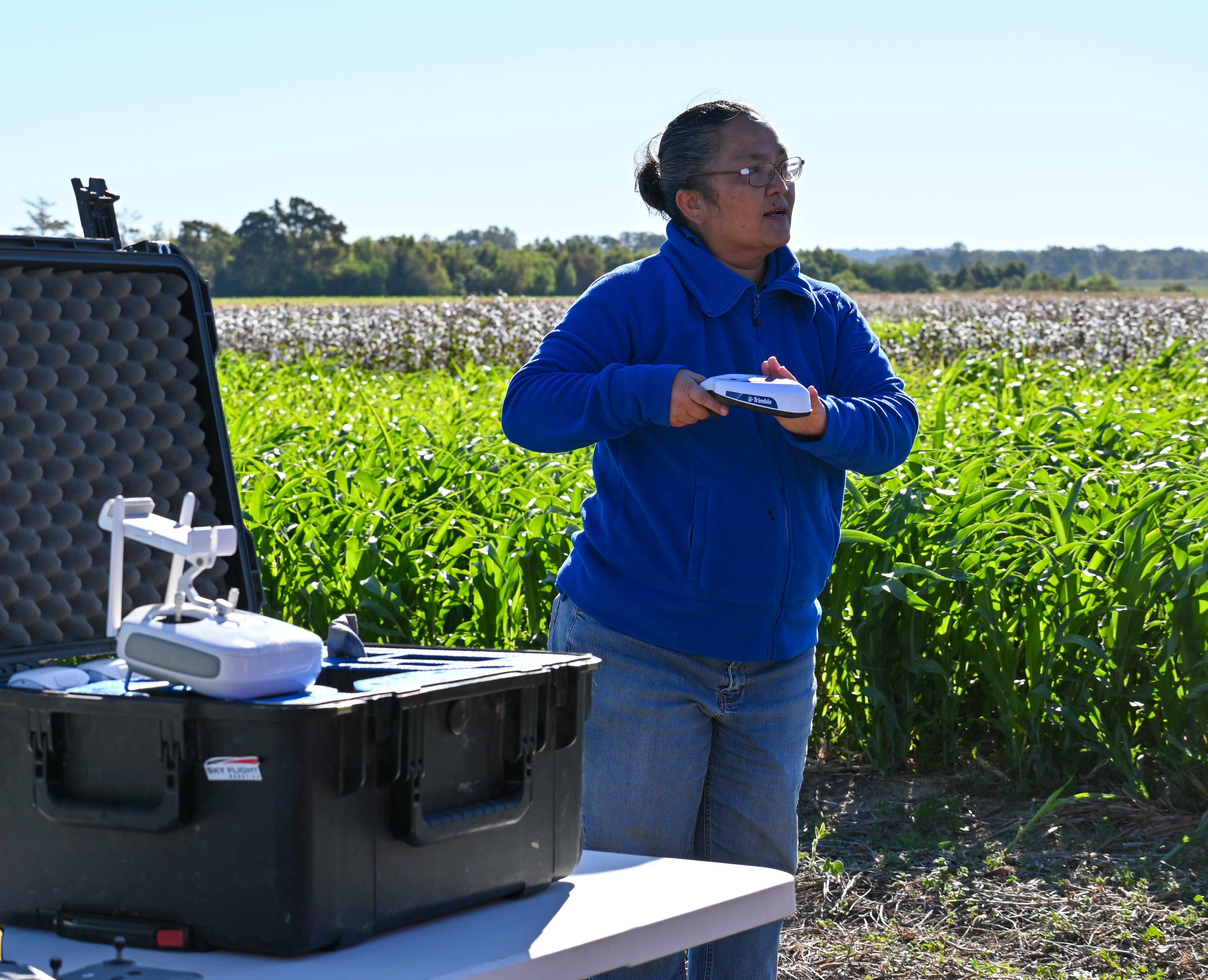Brenda Tubana giving a presentation at a field day.